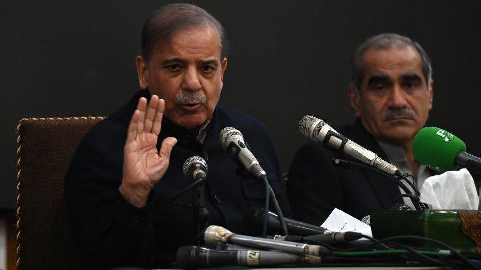 Shahbaz Sharifat a press conference