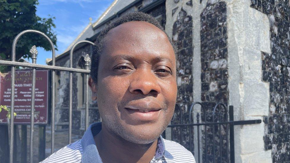 Father Anthony Nwanko outside St Mary's Roman Catholic Church in Great Yarmouth, Norfolk