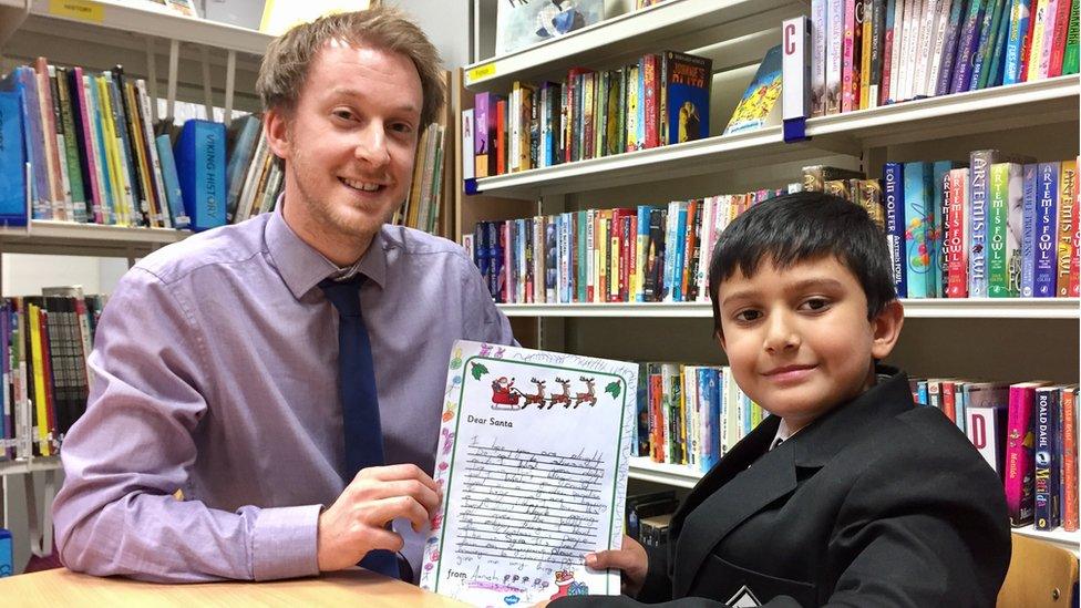 Aarush Anand (right) and year three teacher Richard Miller