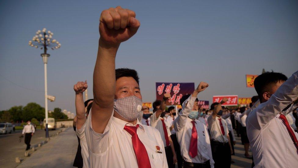 North Korean students take part in a rally denouncing "defectors from the North" as they march from the Pyongyang Youth Park Open-Air Theatre to Kim Il Sung Square in Pyongyang on June 8, 2020.