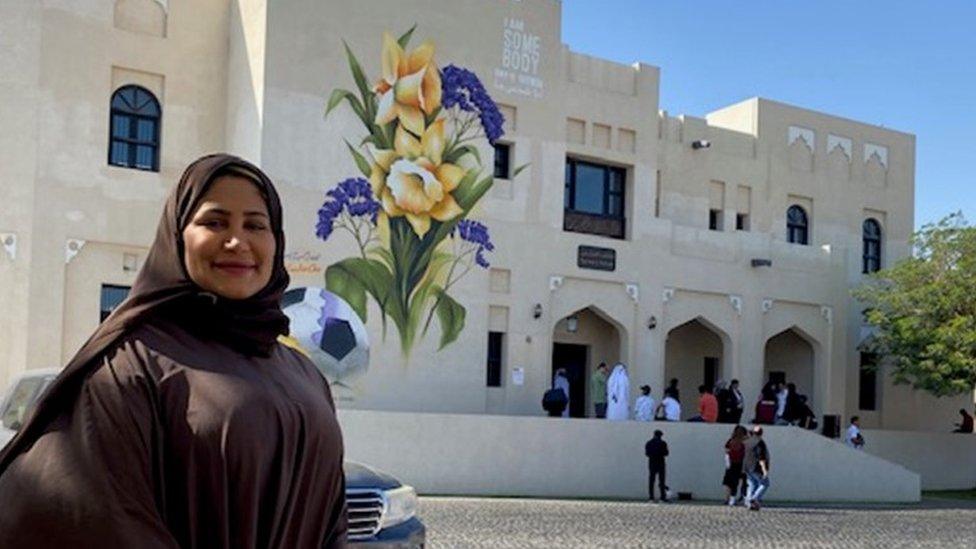 Muna Albader and mural