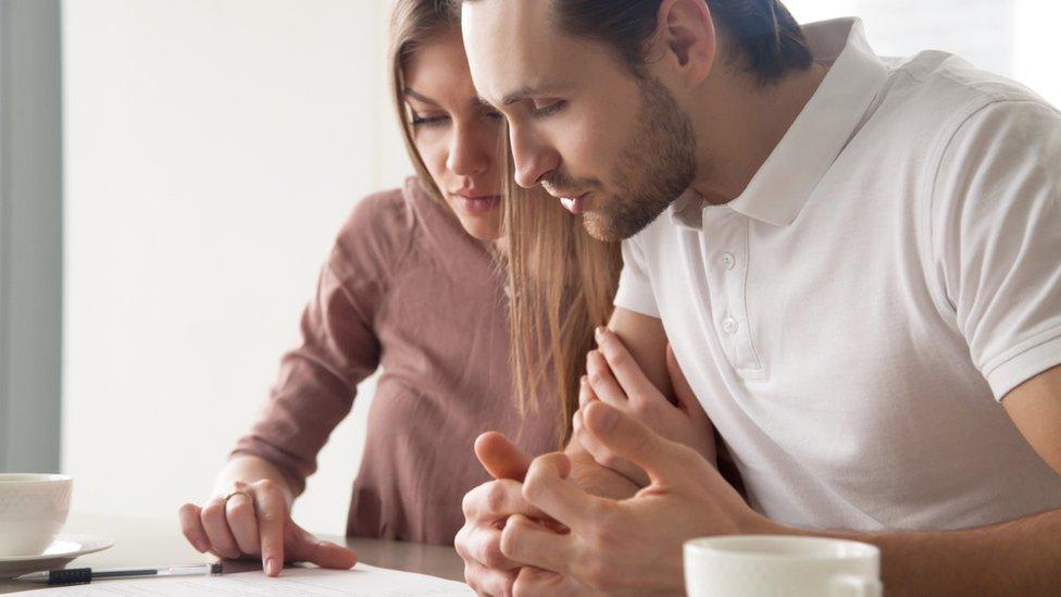 Couple looking at finances