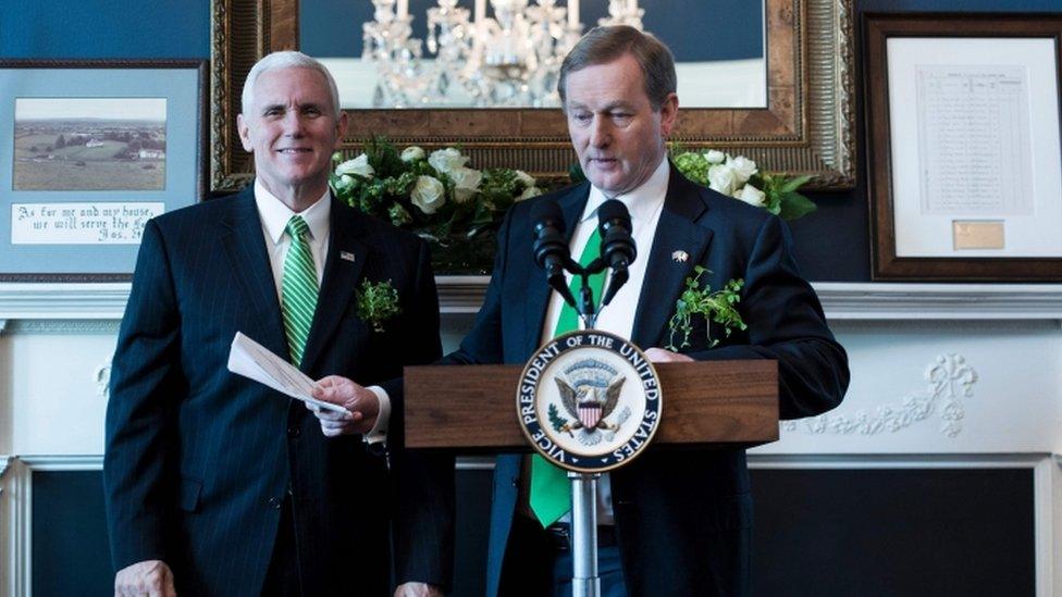 Mr Pence and Mr Kenny have shamrock pinned to their jackets for Saint Patrick's Day