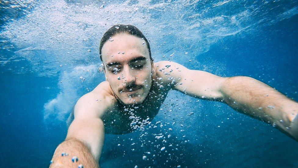 Stefanos swimming in the sea