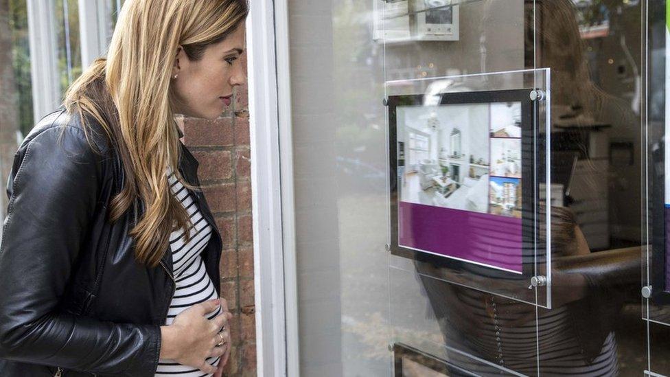 Woman at estate agents