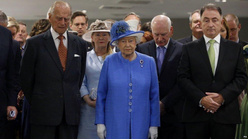 Queen and Duke of Edinburgh observe silence