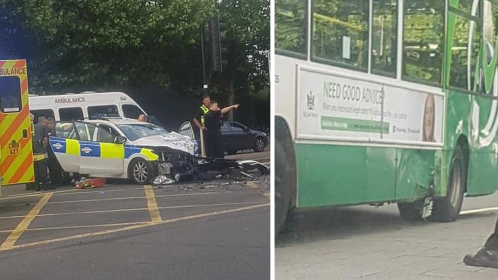 Damaged police car and bus