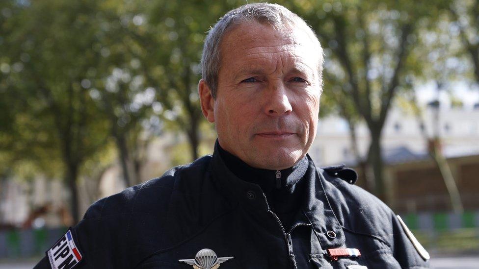 Jean-Michel Fauvergue, head of the RAID, the French national police intervention group, poses during a public exercise in front of the Chateau de Versailles, outside Paris, on October 11, 2014