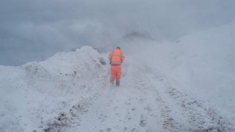 A member of Redcar and Cleveland council inspects a blocked road on March 1, 2018 in Liverton Mines, United Kingdom