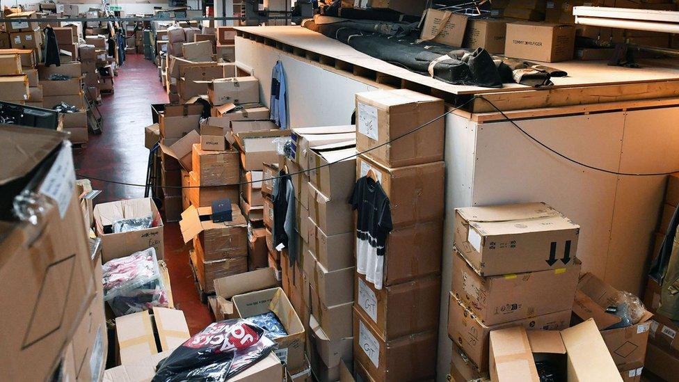 Boxes of counterfeited items inside warehouse