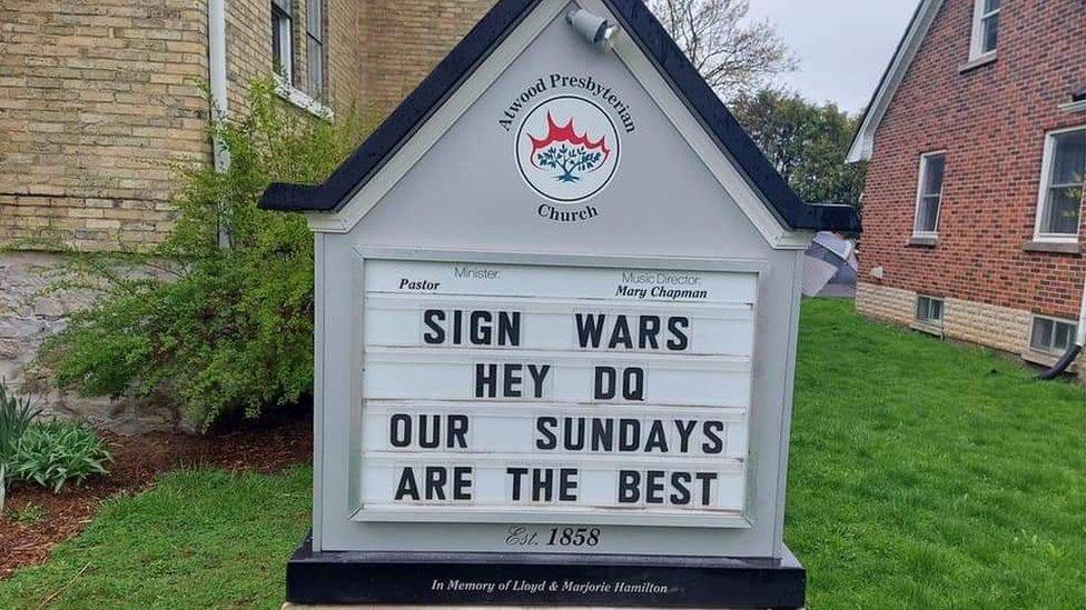 A sign at a church reads 'Hey DQ, our Sundays are the best'