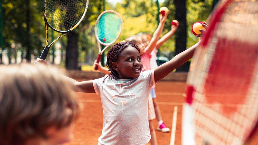 Girl playing tennis