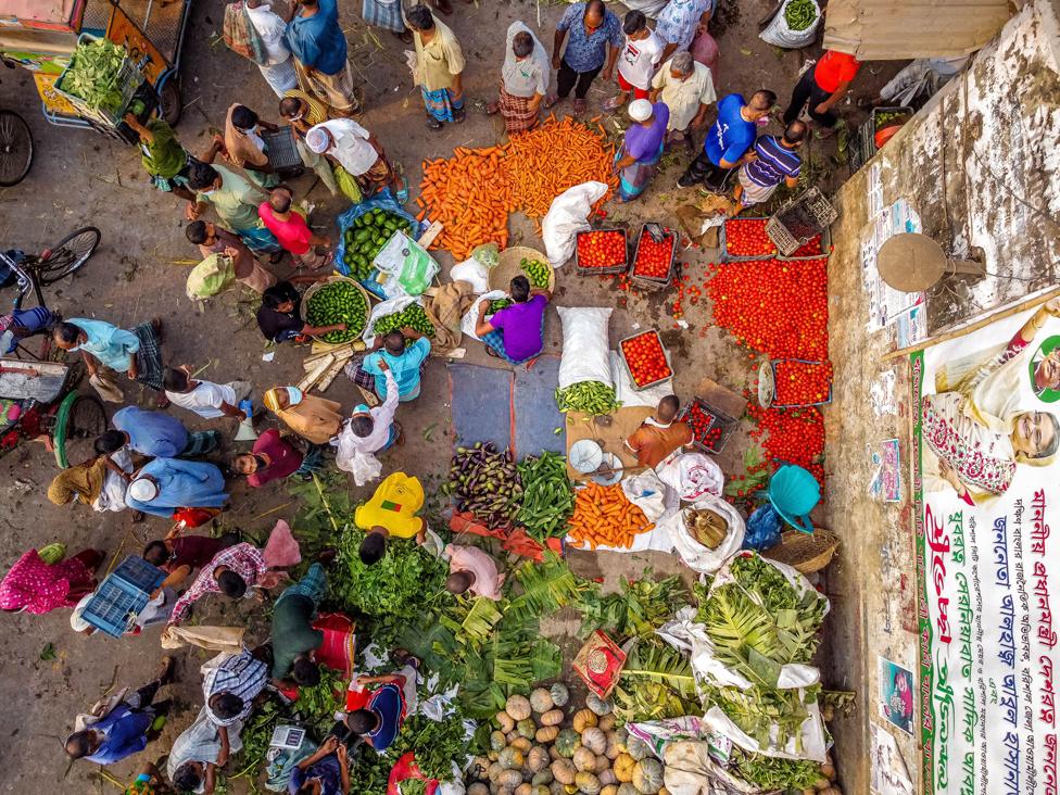 An aerial view of people shopping at a vegetable market, Barishal, Bangladesh (13 April)