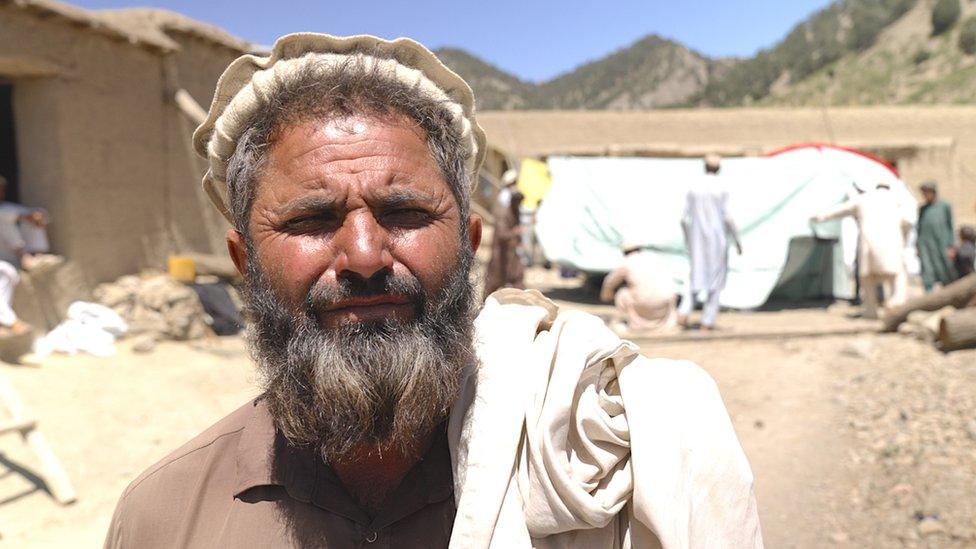 Image shows man with beard