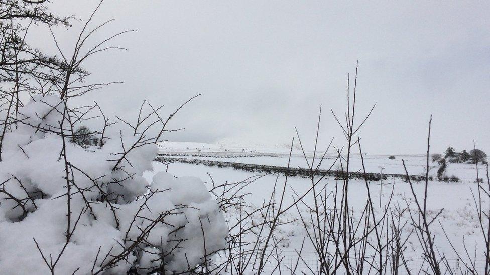 Snow smothers the landscape near Slemish in County Antrim