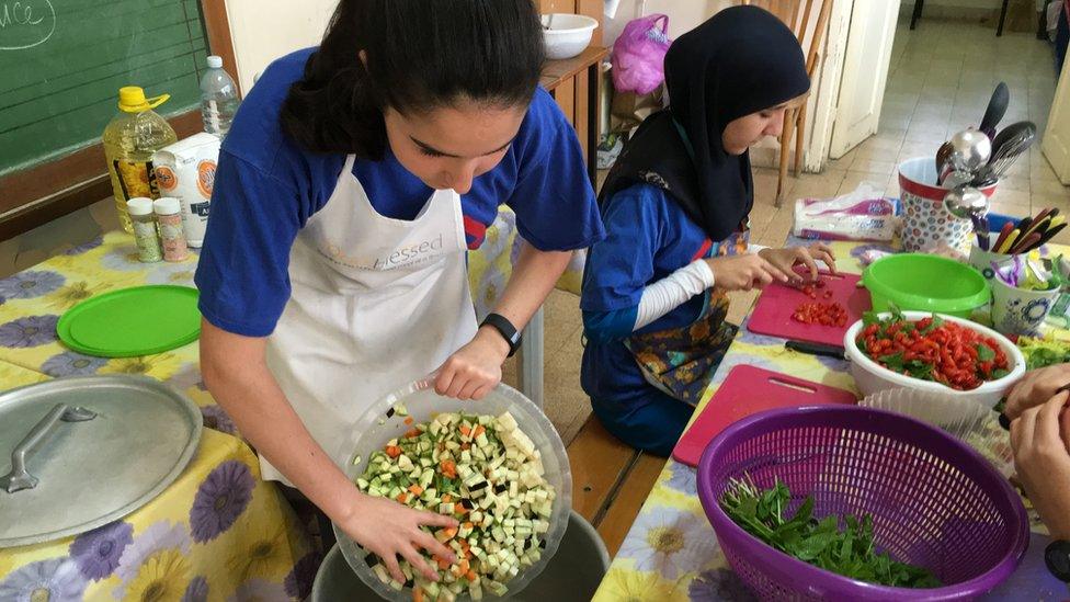 FloodBlessed volunteers preparing food