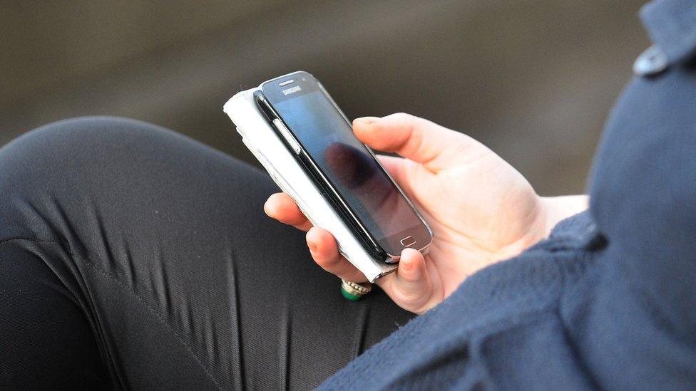 Woman using a mobile phone