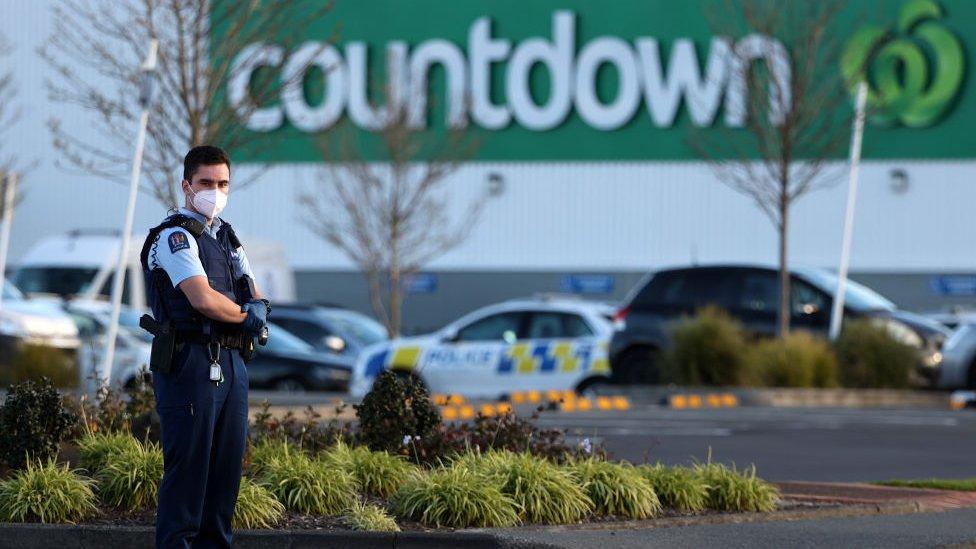 Armed police patrol the area around Countdown LynnMall