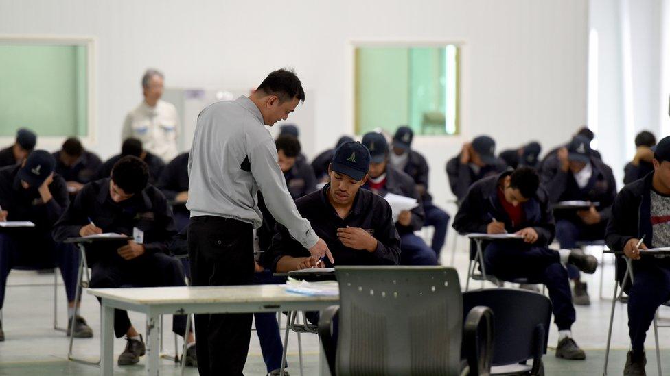 Saudi students pass their final exams at a workshop in the Higher Institute for Plastics Fabrication on June 13, 2016 in Riyadh