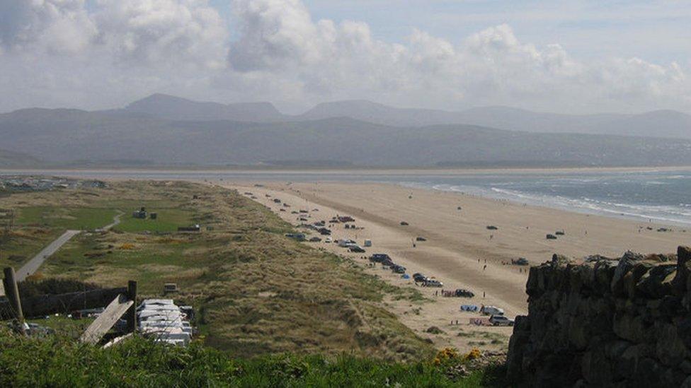 A view of Morfa Bychan beach from a hillside