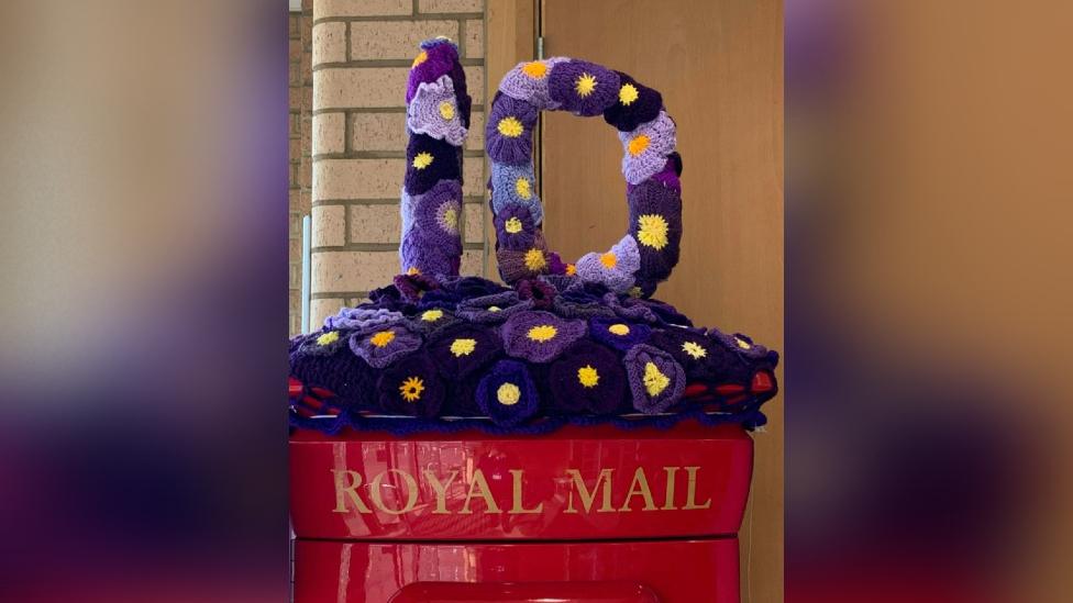 Purple post box topper with number 10