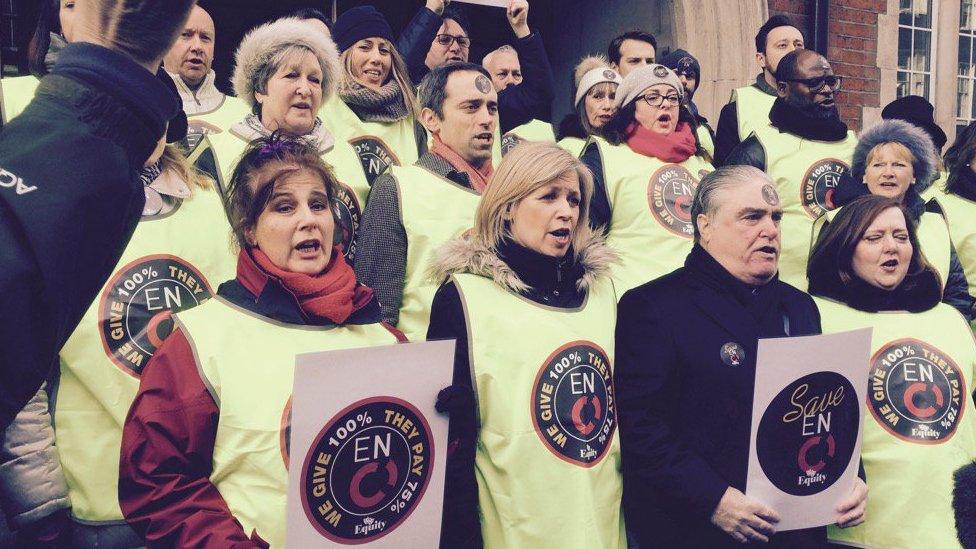 Striking ENO choristers singing outside the Arts Council England offices