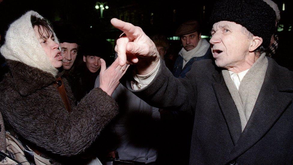 Muscovites argue outside Moscow city hall in December 1991