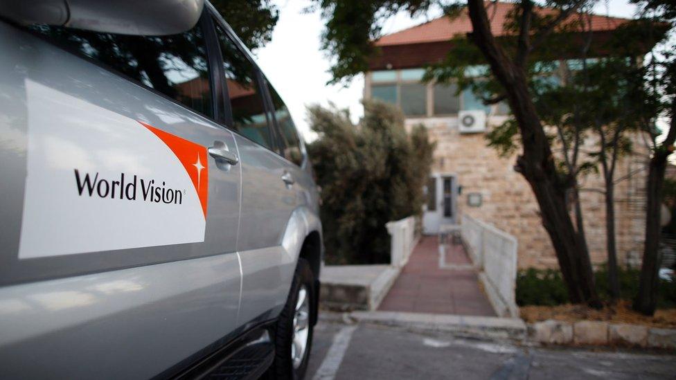 File photo showing a vehicle belonging to the charity World Vision outside its office in occupied East Jerusalem (4 August 2016)