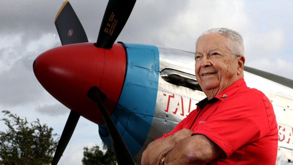 Lieutenant Colonel George Hardy standing next to his P51D Mustang plane at North Weald Airfield in Essex.