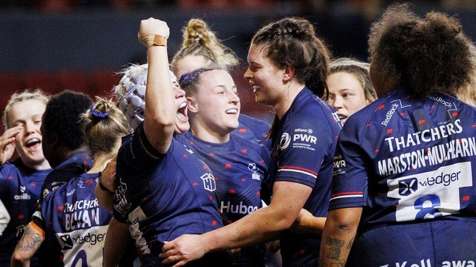 Lana Skeldon and fellow Bristol Bears players celebrate a try against Loughborough Lightning at Ashton Gate