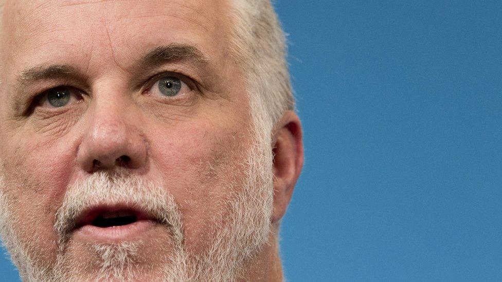 Quebec Premier Philippe Couillard gives a press conference following his meeting with French Prime Minister at the Hotel Matignon in Paris, on March 6, 2015.