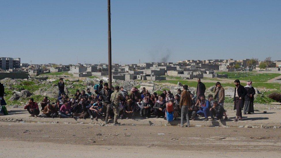 Men from western Mosul are taken off for interrogation by Iraqi forces battling to retake western Mosul from IS