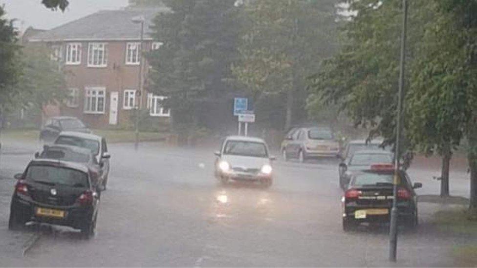 A flooded street in Moseley, Birmingham