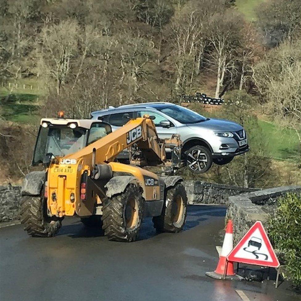 Car recovered after flooding at Llanfair Talhaiarn