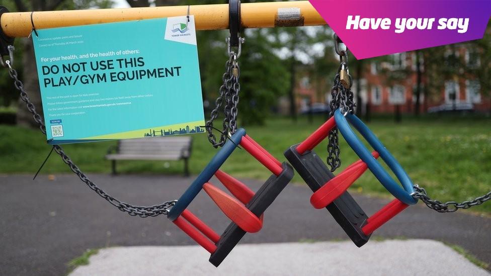 Swings tied up with a sign saying do not use this play/gym equipment