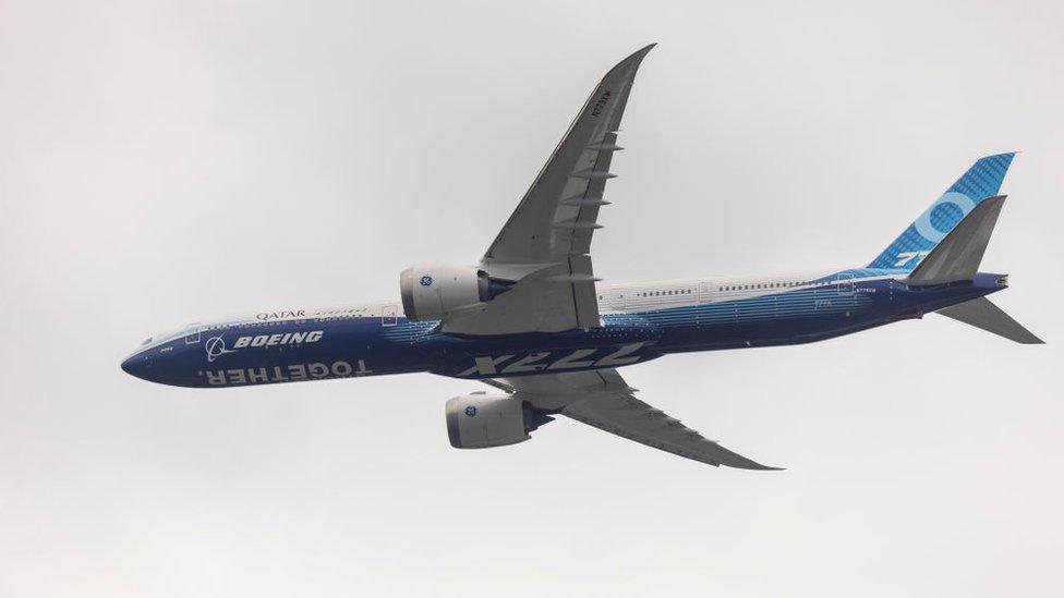 Boeing 777x performs a flyover after the final round of the Boeing Classic at The Club at Snoqualmie Ridge on August 22, 2021