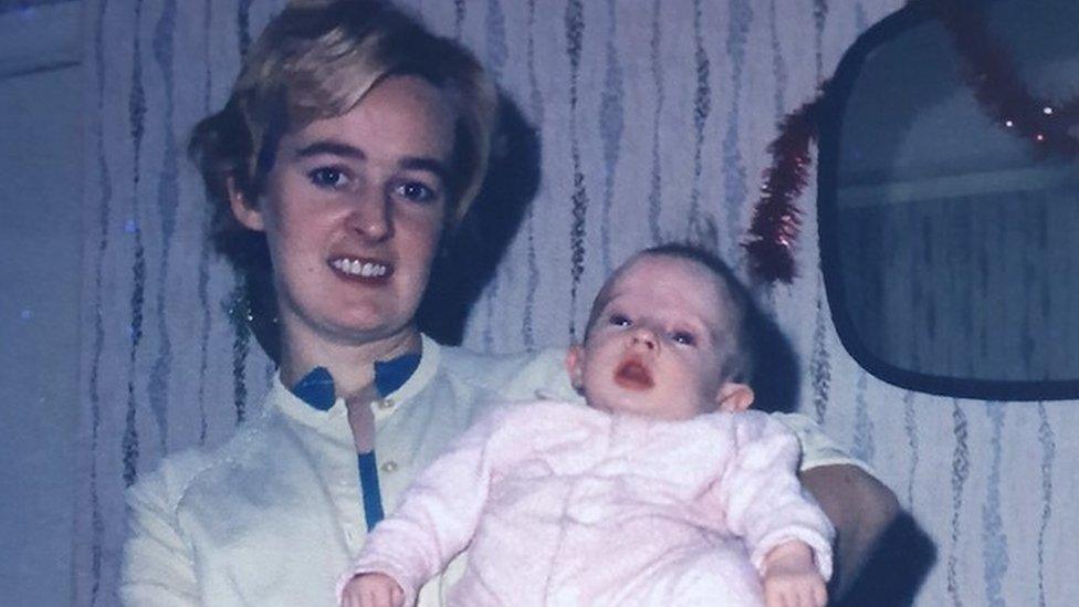 Bethan Dickson as a baby with her mother