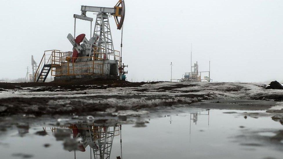 A pumpjack in operation at an oil field in Russia.