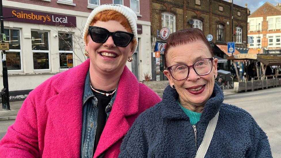 Laura and Anne - Lewisham vox pops about elected mayor by election Laura is wearing pink coat Anne has green gloves Interview in Hither Green on 26th Feb 2024