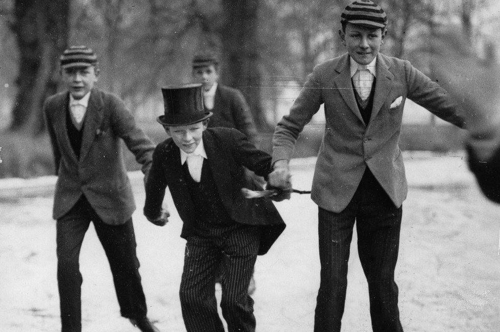 Schools boys ice skating