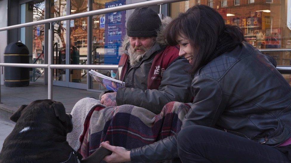 Simone Butler with a homeless man called Gary and his dog Lola