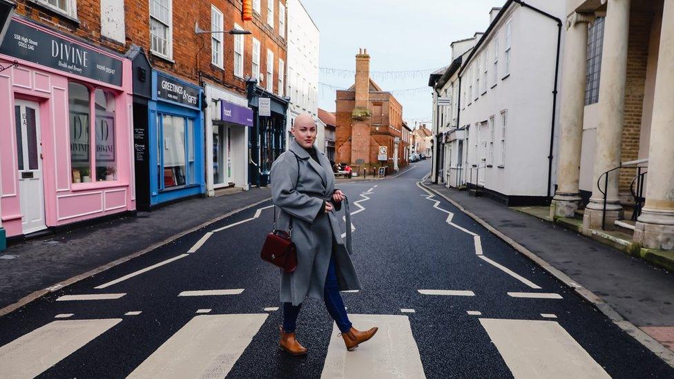 Laura walking down Manningtree high street