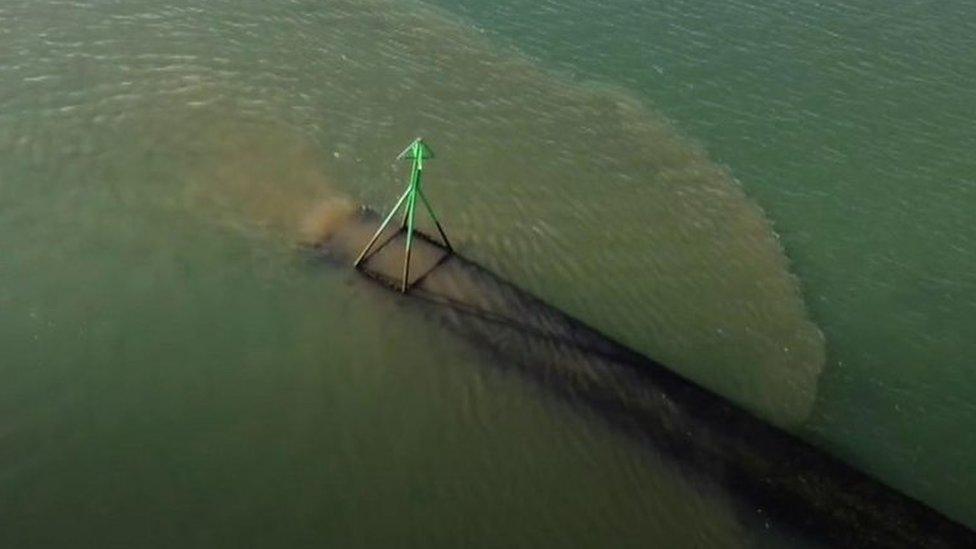 Sewage pipe in Langstone Harbour