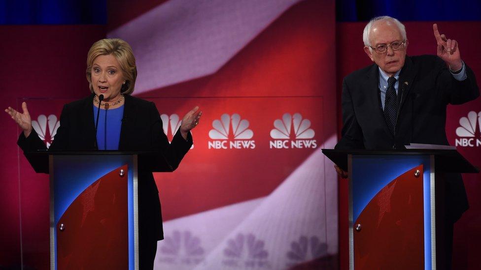 Democratic presidential candidates, former Secretary of State Hillary Clinton (L) and Vermont Senator Bernie Sanders (R) participate in the NBC News -YouTube Democratic Candidates Debate on January 17, 2016