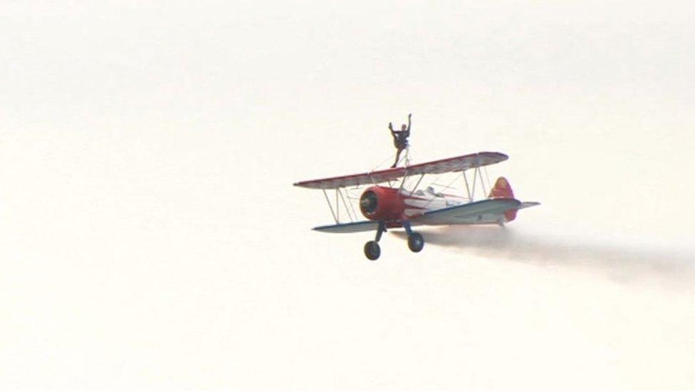 Wingwalker on biplane