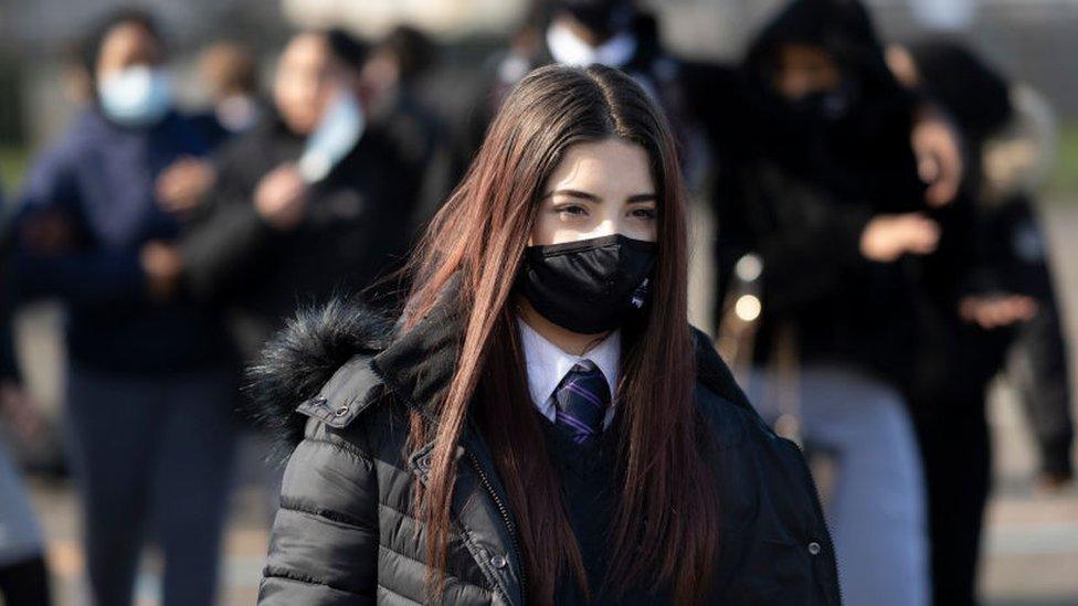 school pupil with face mask