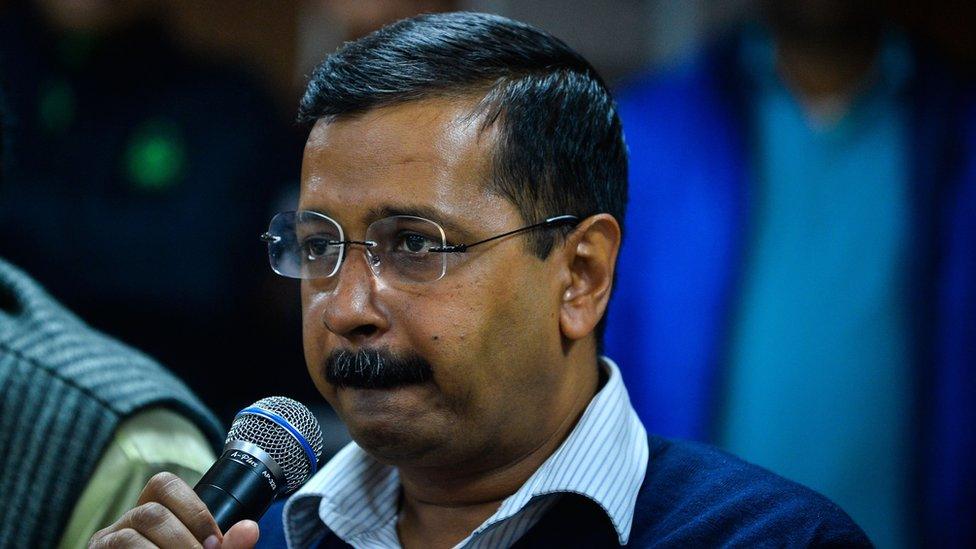 Delhi Chief Minister Arvind Kejriwal gestures as he addresses the media in New Delhi on December 24, 2015.