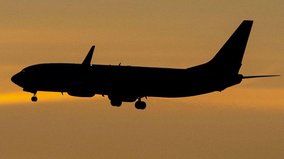 plane coming in to land at Liverpool Airport