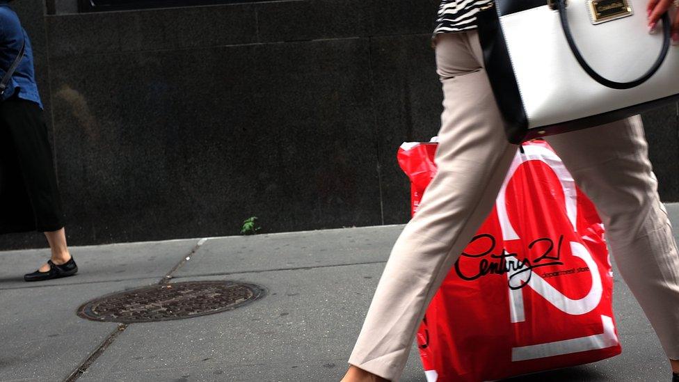 women with shopping bags