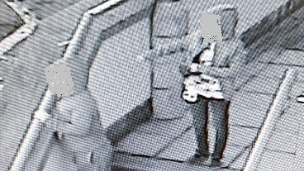 CCTV still which captures children who were approached by Owain Thomas